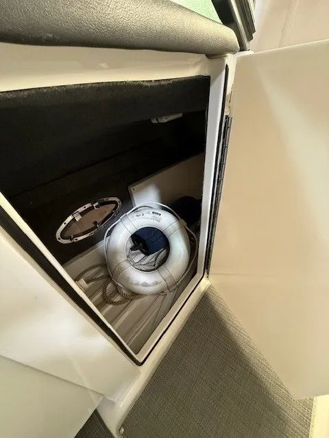 Slide: The Image of Storage compartment in 2016 Formula 350 FX Crossover Bowrider boat. - 27