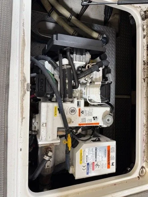 Slide: The Image of Engine compartment of a 2016 Formula 350 FX Crossover Bowrider boat. - 34