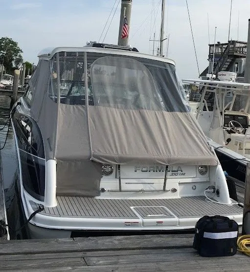 Slide: The Image of 2016 Formula 350 FX Crossover Bowrider docked with cover. - 6