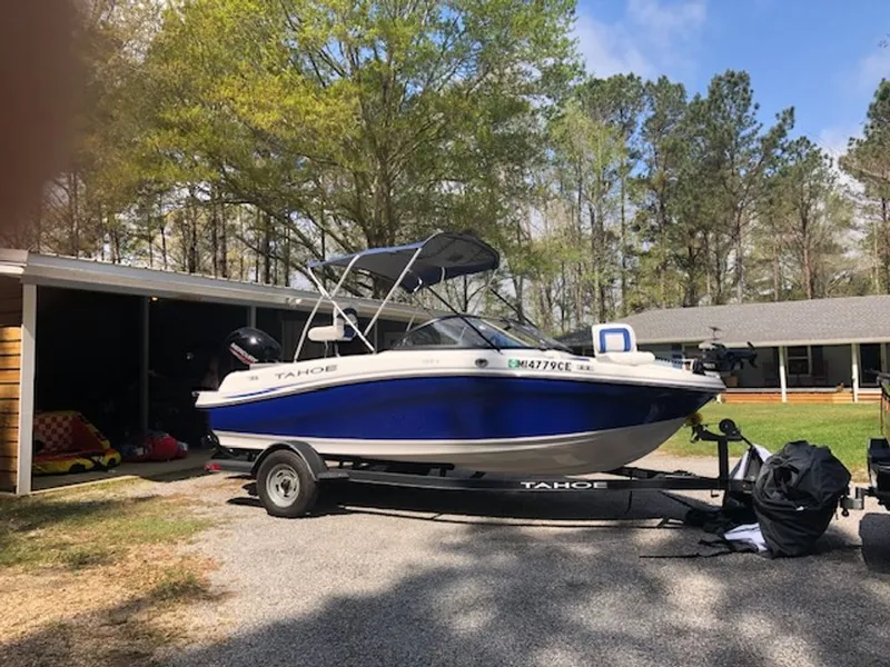 The Image of 2024 Tahoe 185 S boat parked on trailer outdoors. - 0