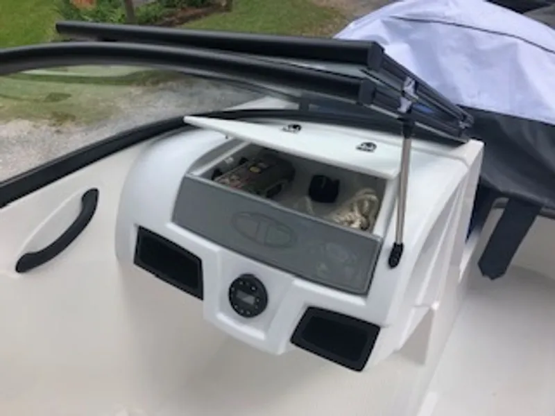 Slide: The Image of Dashboard of 2024 Tahoe 185 S boat with storage compartment. - 10