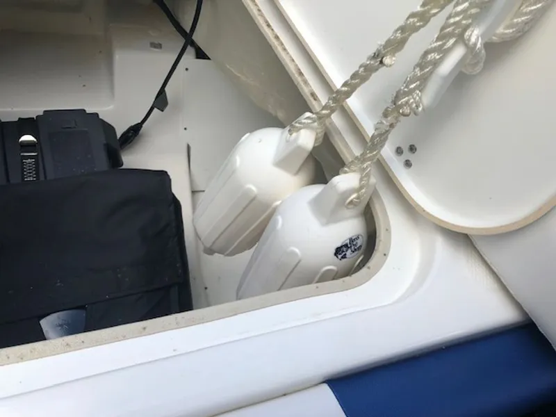 Slide: The Image of Interior of a 2024 Tahoe 185 S boat with fenders. - 13