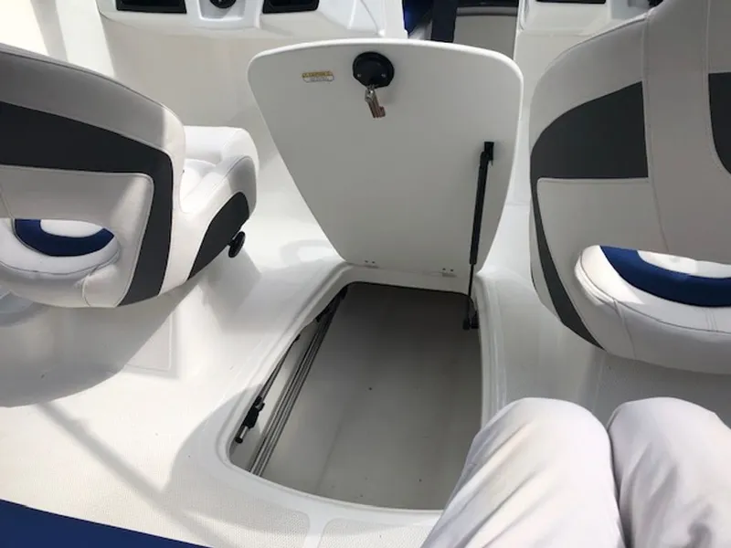 Slide: The Image of Interior of 2024 Tahoe 185 S boat with storage compartment. - 14