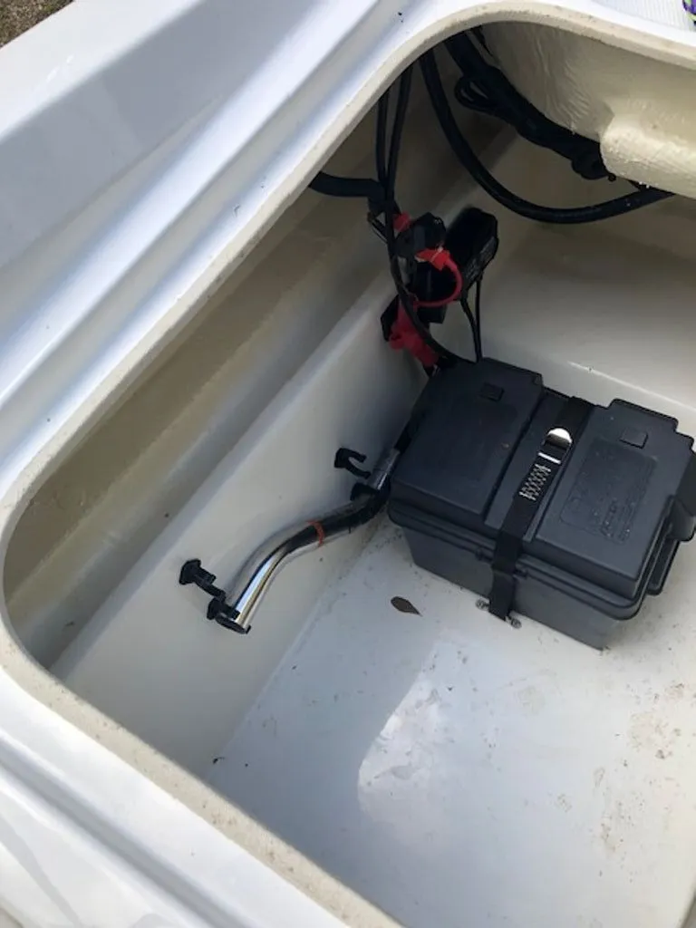 Slide: The Image of Battery compartment in 2024 Tahoe 185 S boat. - 15