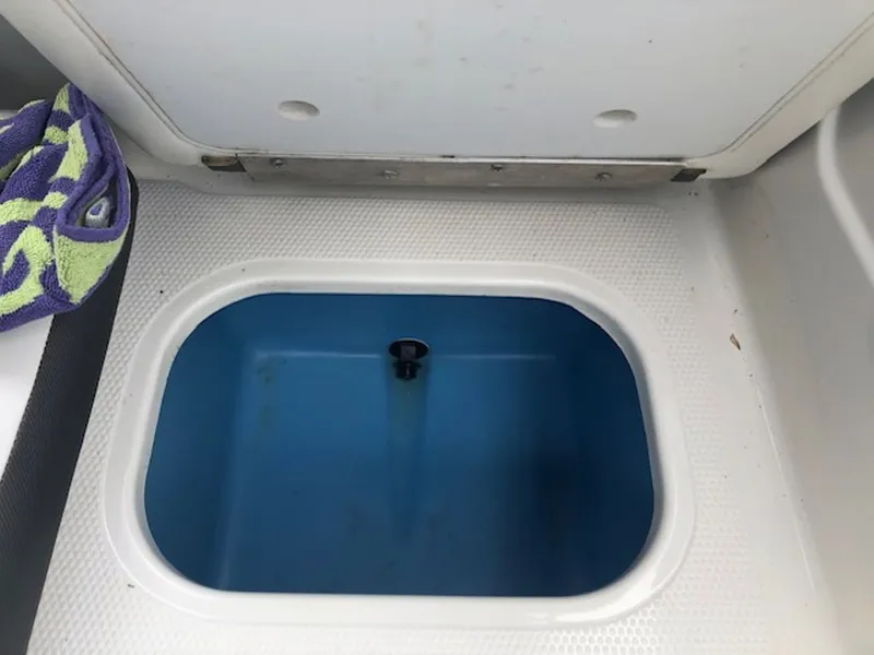 Slide: The Image of 2024 Tahoe 185 S boat compartment with blue interior. - 20