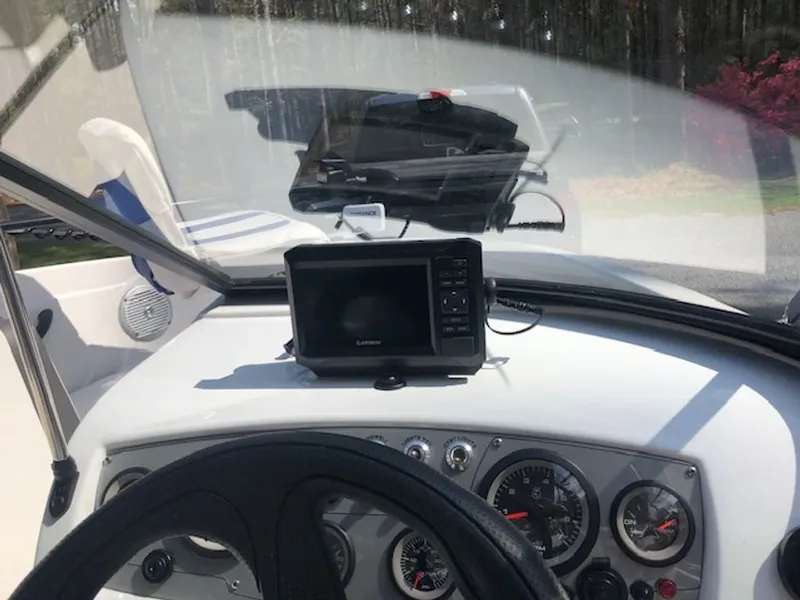 Slide: The Image of Dashboard of a 2024 Tahoe 185 S boat with navigation system. - 3