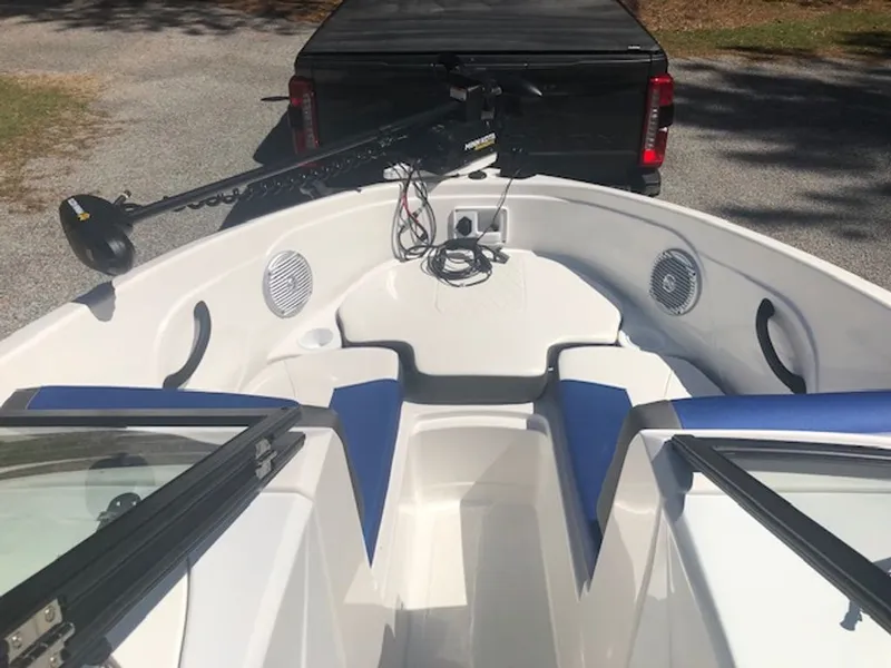 Slide: The Image of 2024 Tahoe 185 S boat with blue and white seating and speakers. - 6