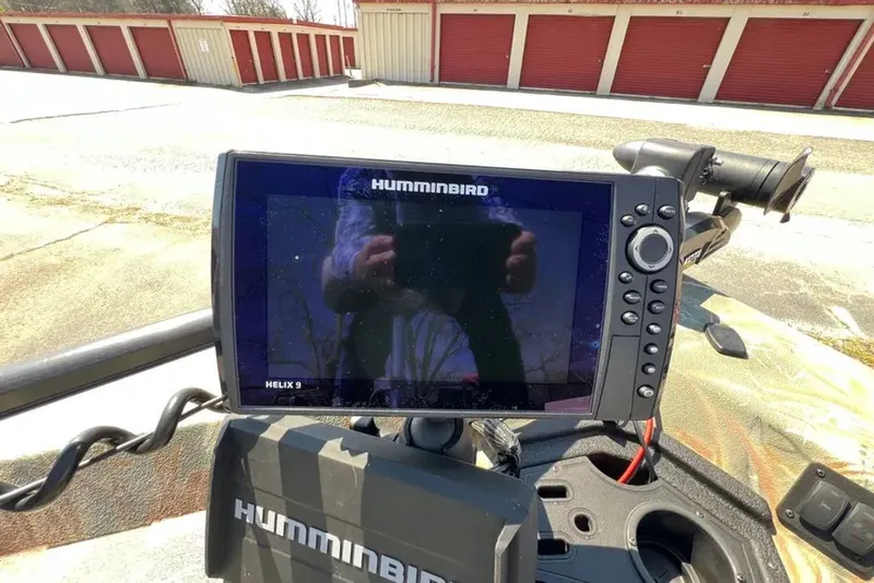Slide: The Image of Humminbird Helix 9 on a 2015 Hurricane Sundeck boat. - 4