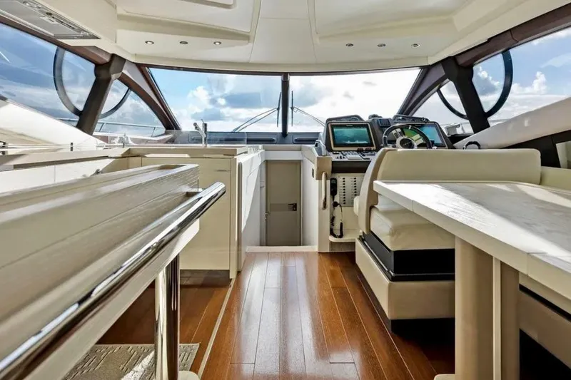 Slide: The Image of Luxurious interior of a 2016 Azimut 54 yacht with modern helm and seating. - 32
