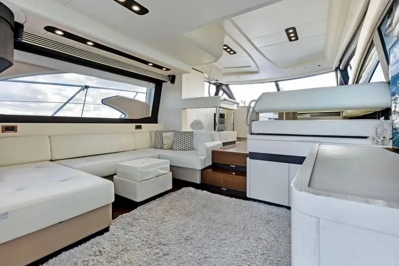 Slide: The Image of Luxurious interior of a 2016 Azimut 54 yacht with modern white furnishings. - 41