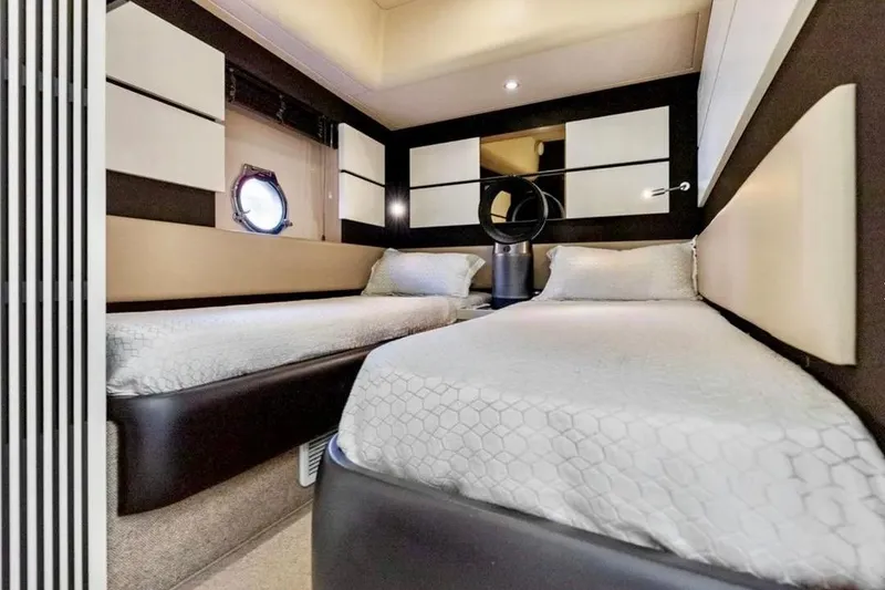 Slide: The Image of Luxurious twin cabin interior of 2016 Azimut 54 yacht with modern design elements. - 48