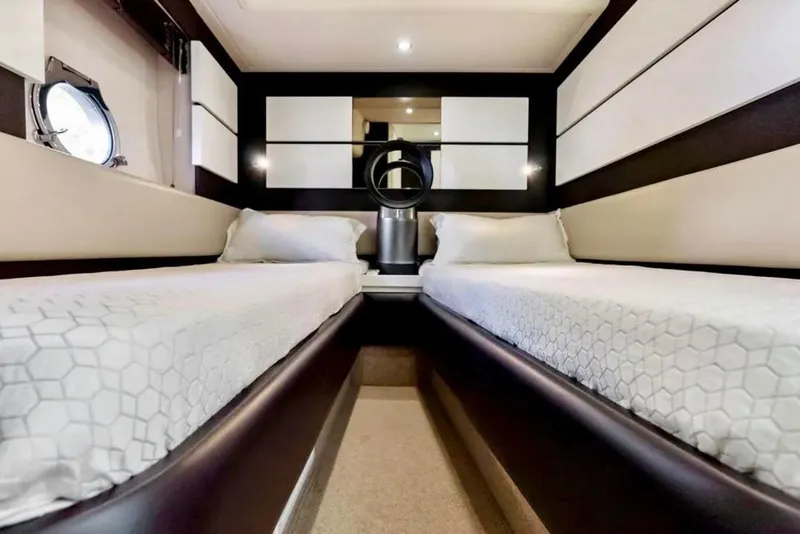 Slide: The Image of Luxurious twin cabin interior of 2016 Azimut 54 yacht with modern design elements. - 49