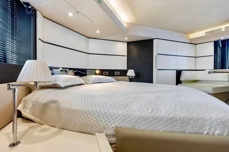 Slide: The Image of Luxurious bedroom interior of 2016 Azimut 54 yacht with modern design and elegant furnishings. - 52