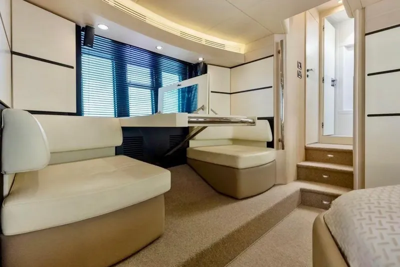 Slide: The Image of Luxurious interior of a 2016 Azimut 54 yacht with elegant seating and modern design. - 54