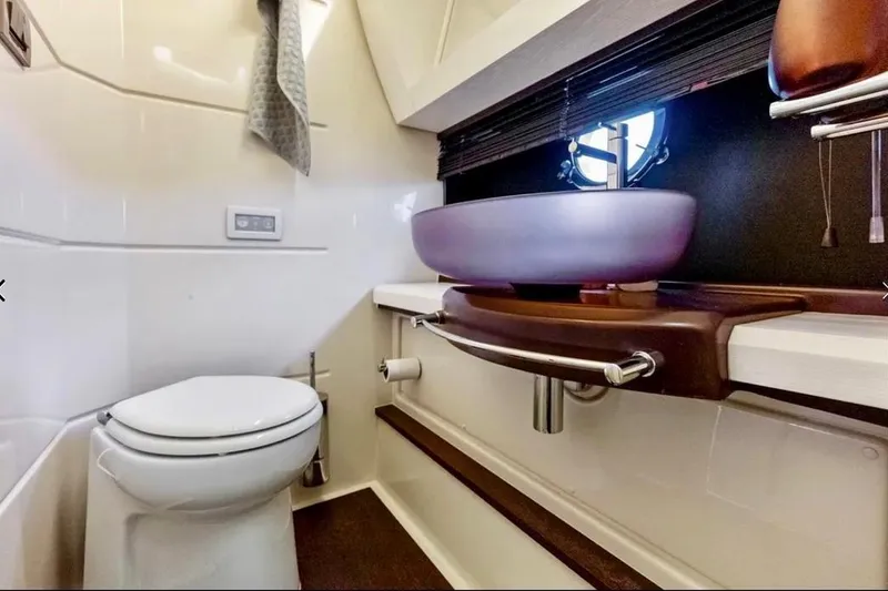Slide: The Image of Luxurious bathroom interior of 2016 Azimut 54 yacht with modern fixtures. - 56
