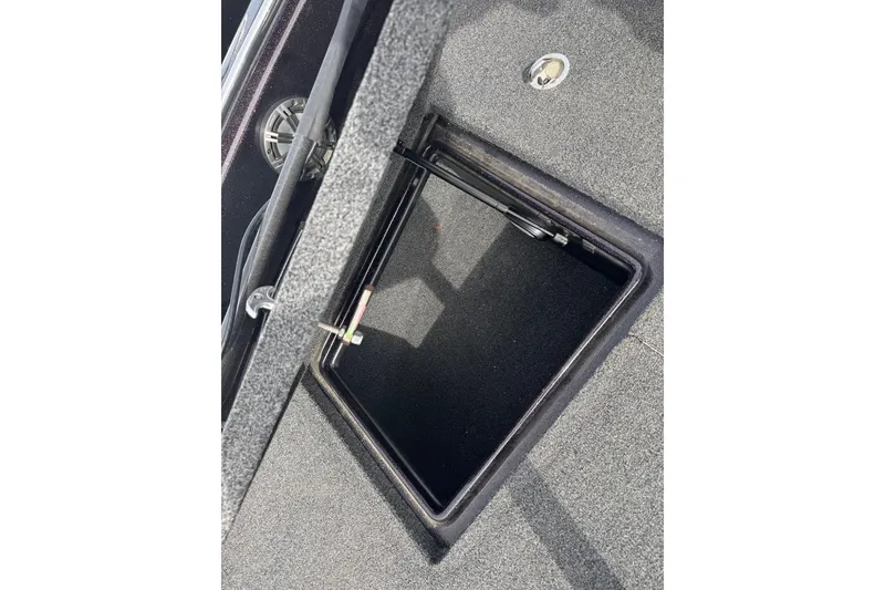 Slide: The Image of Open storage compartment in 2020 Nitro ZV19 Sport boat. - 18