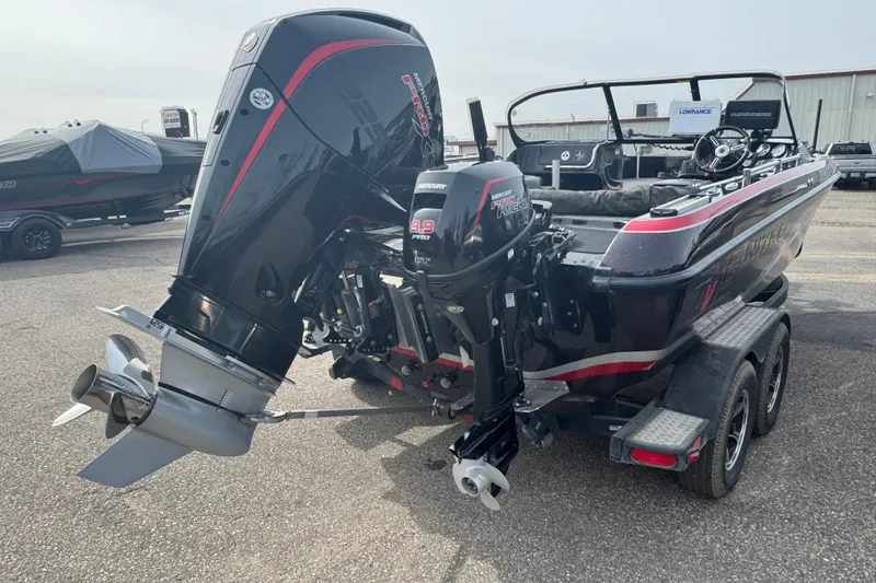 Slide: The Image of 2020 Nitro ZV19 Sport boat with dual Mercury outboard motors on a trailer. - 3