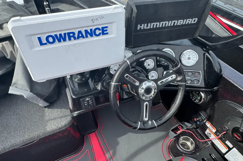 Slide: The Image of 2020 Nitro ZV19 Sport boat dashboard with Lowrance and Humminbird displays. - 6