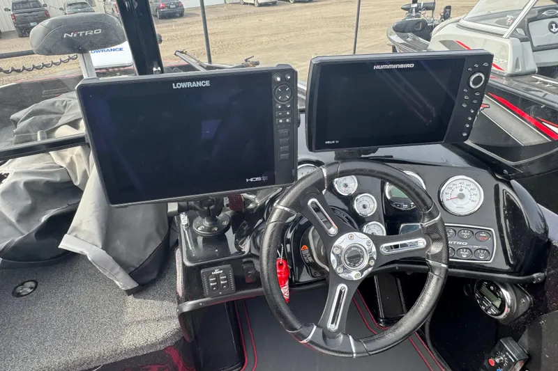 Slide: The Image of Dashboard of a 2020 Nitro ZV19 Sport boat with Lowrance and Humminbird displays. - 7
