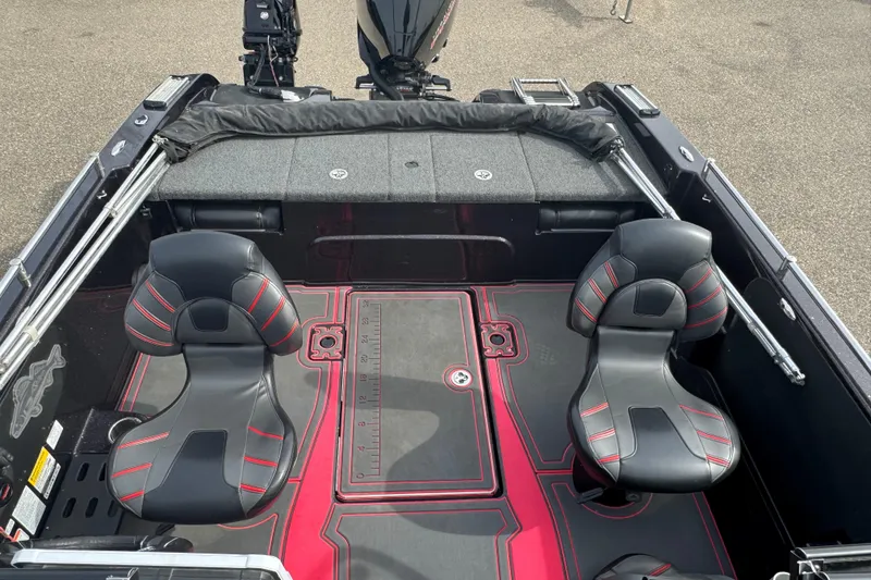 Slide: The Image of 2020 Nitro ZV19 Sport boat interior with black and red seating and deck. - 8