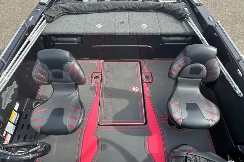 Slide: The Image of 2020 Nitro ZV19 Sport boat interior with black and red seating. - 9