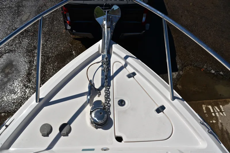 Slide: The Image of Bow view of 2016 Regal 26 Express boat with anchor and chain. - 28