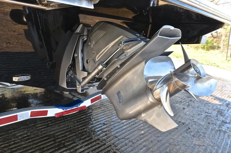 Slide: The Image of 2016 Regal 26 Express boat propeller and stern drive close-up. - 37