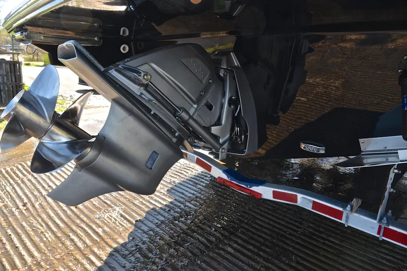Slide: The Image of Close-up of a 2016 Regal 26 Express boat propeller and stern drive on a trailer. - 38