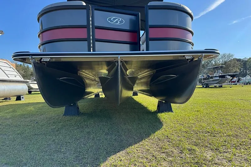 Slide: The Image of 2026 Bentley Pontoons 243 Fish-N-Cruise on grass, showcasing pontoon design. - 10