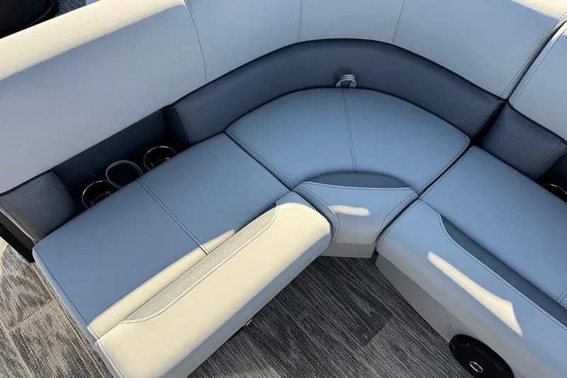 Slide: The Image of Luxurious seating on 2026 Bentley Pontoons 243 Fish-N-Cruise with integrated cup holders. - 24