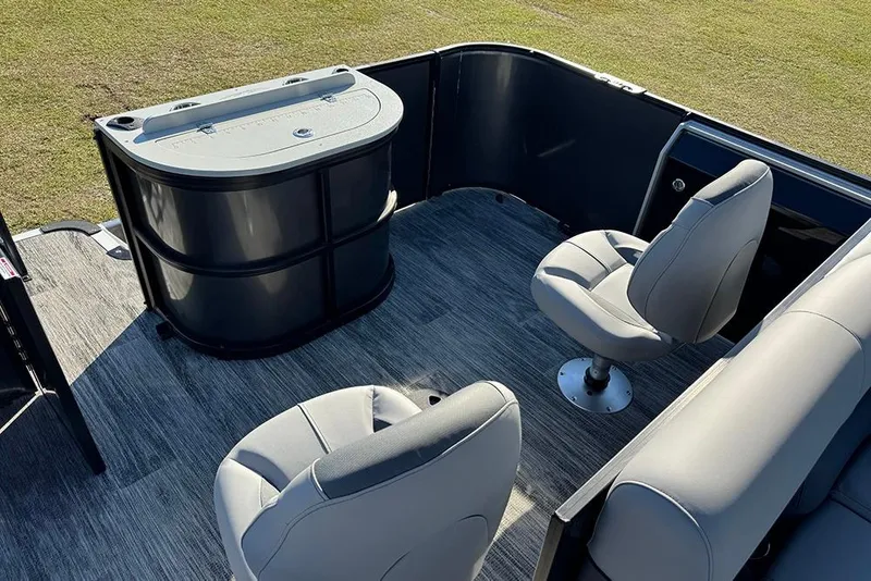 Slide: The Image of 2026 Bentley Pontoons 243 Fish-N-Cruise interior with seating and storage. - 37