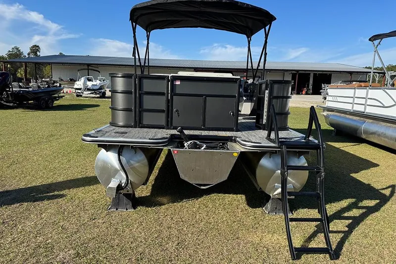 Slide: The Image of 2026 Bentley Pontoons 243 Fish-N-Cruise pontoon boat on grass with ladder and canopy. - 4