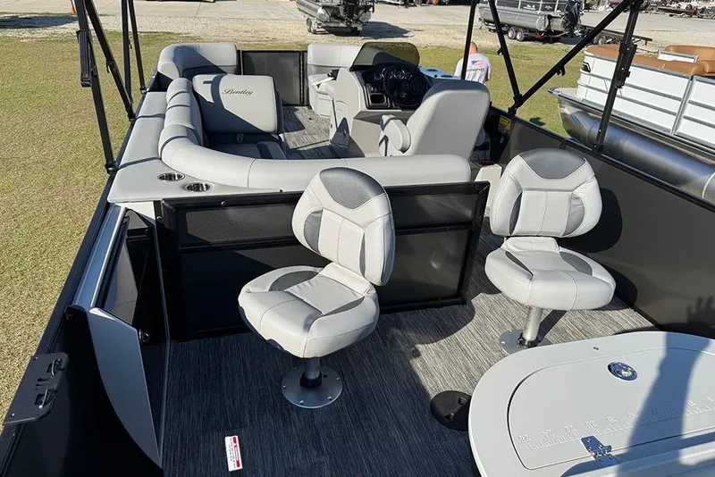 Slide: The Image of 2026 Bentley Pontoons 243 Fish-N-Cruise interior with plush seating and modern design. - 46
