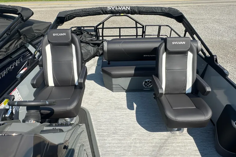 Slide: The Image of 2026 Sylvan X3 CLZ DH boat interior with black and white seating. - 17