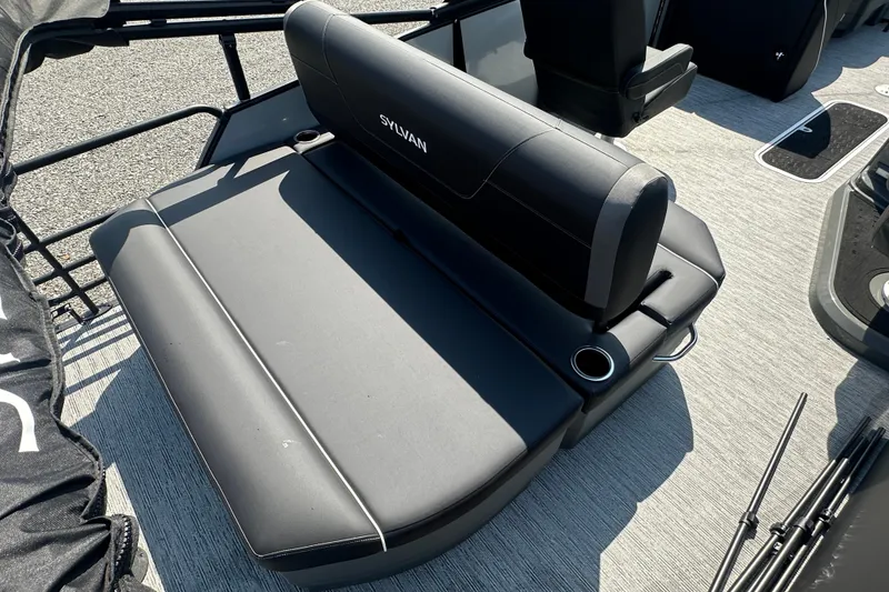 Slide: The Image of Luxurious seating on 2026 Sylvan X3 CLZ DH boat, featuring sleek black upholstery. - 19
