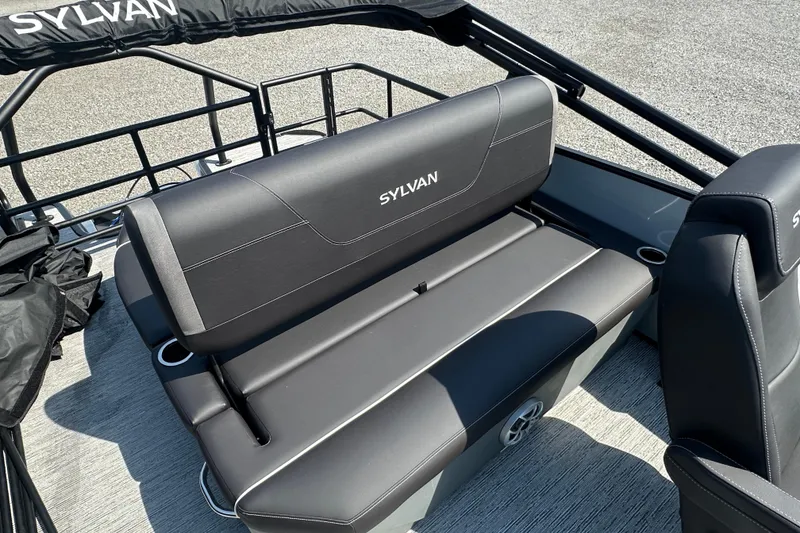 Slide: The Image of 2026 Sylvan X3 CLZ DH boat interior with sleek black seating and cup holders. - 20