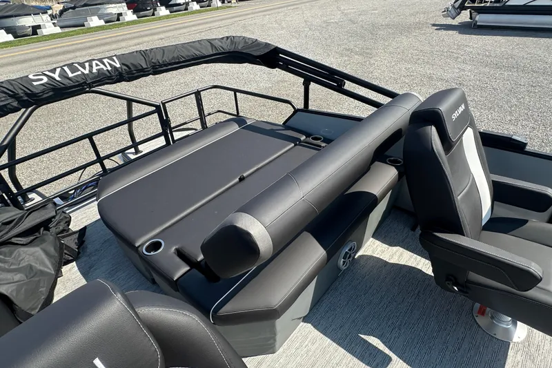 Slide: The Image of 2026 Sylvan X3 CLZ DH boat interior with sleek seating and cup holders. - 21