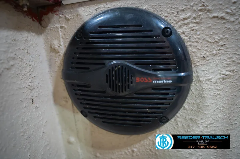 Slide: The Image of Marine speaker on a 1997 Lund 1650 Angler SS boat interior wall. - 38