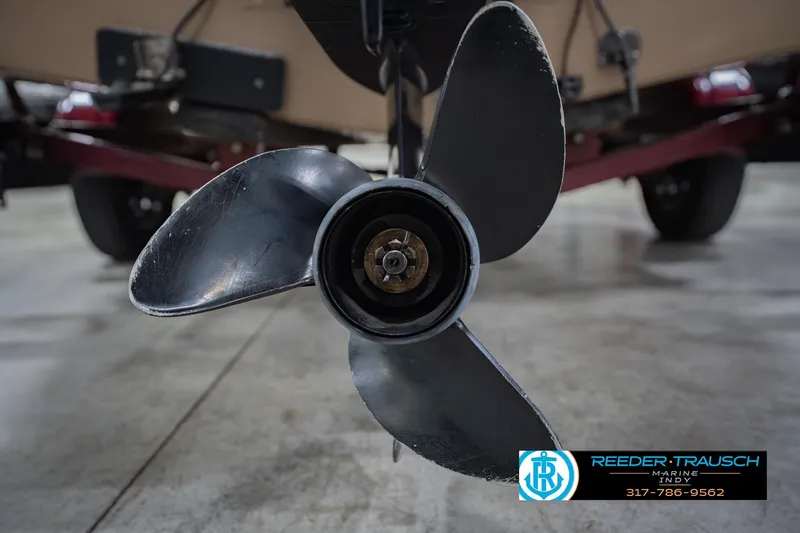 Slide: The Image of Close-up of a 1997 Lund 1650 Angler SS boat propeller on a trailer. - 45