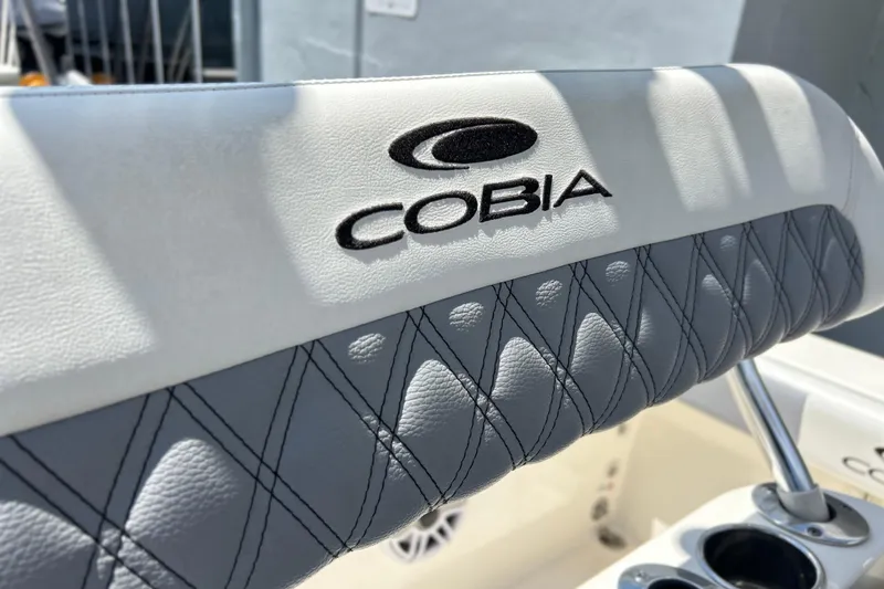 Slide: The Image of Cobia 220 Center Console 2019 boat seat with embroidered logo and diamond stitching. - 13