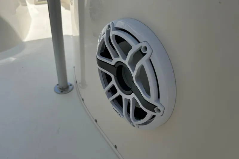 Slide: The Image of Close-up of a speaker on a 2019 Cobia 220 Center Console boat. - 6