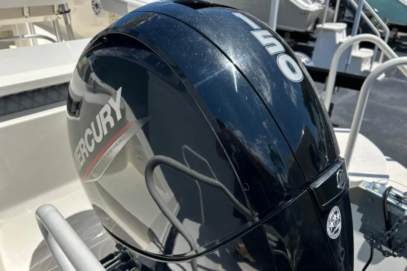 Slide: The Image of 2019 Cobia 220 Center Console with Mercury 150 outboard engine. - 9