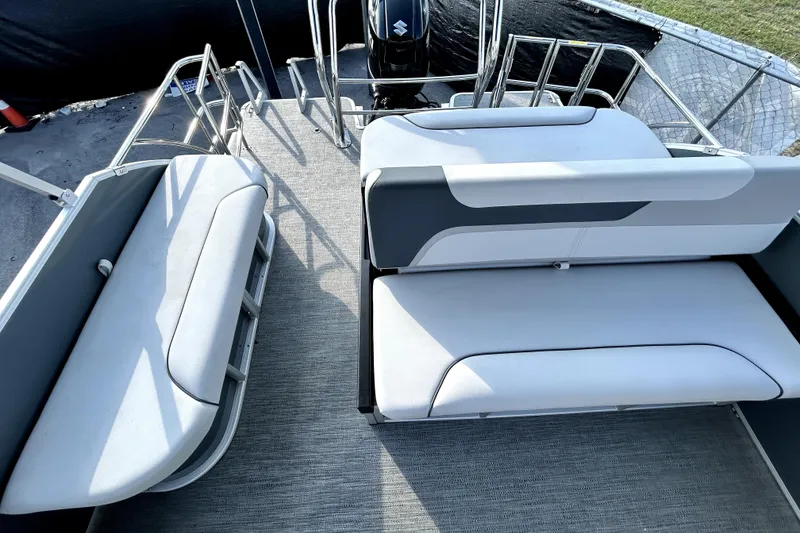 Slide: The Image of Interior view of 2025 Godfrey Sweetwater 2286 SFL pontoon boat with seating and canopy. - 17