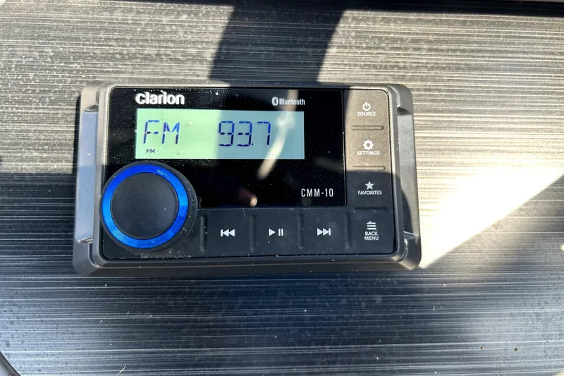 Slide: The Image of Interior of 2025 Godfrey Sweetwater 2286 SFL boat with speaker and cup holders. - 21