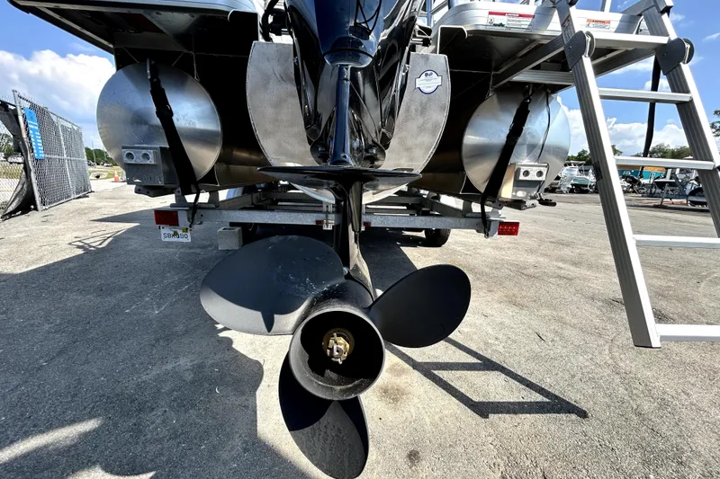 Slide: The Image of 2025 Godfrey Sweetwater 2286 SFL pontoon boat interior with seating and canopy. - 27