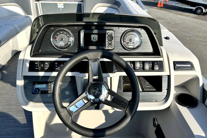 Slide: The Image of 2025 Godfrey Sweetwater 2286 SFL pontoon boat interior with sleek seating and modern design. - 29