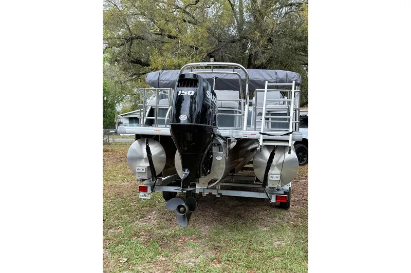 Slide: The Image of 2025 Godfrey Sweetwater 2286 pontoon boat with Suzuki 150 outboard motor. - 3