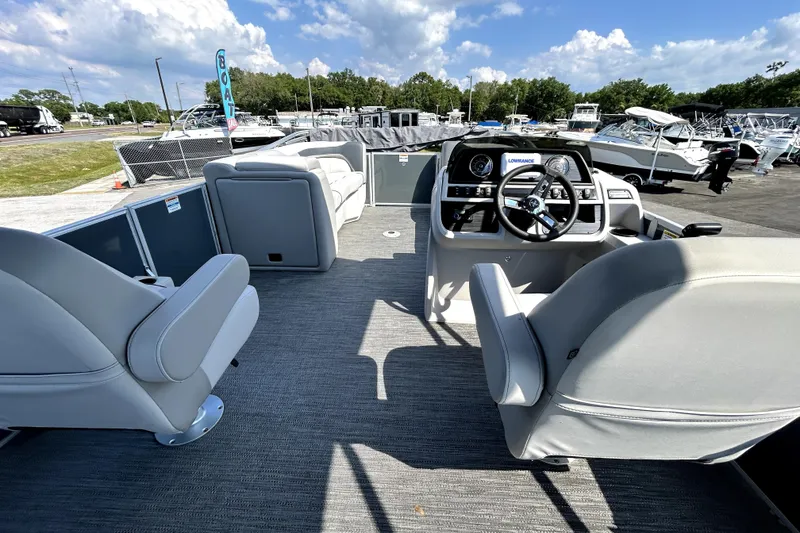 Slide: The Image of 2025 Godfrey Sweetwater 2286 SFL pontoon boat interior with seating and railing. - 35