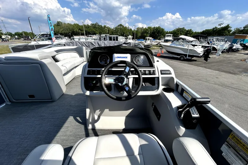 Slide: The Image of Dashboard of 2025 Godfrey Sweetwater 2286 SFL with Lowrance display and gauges. - 58