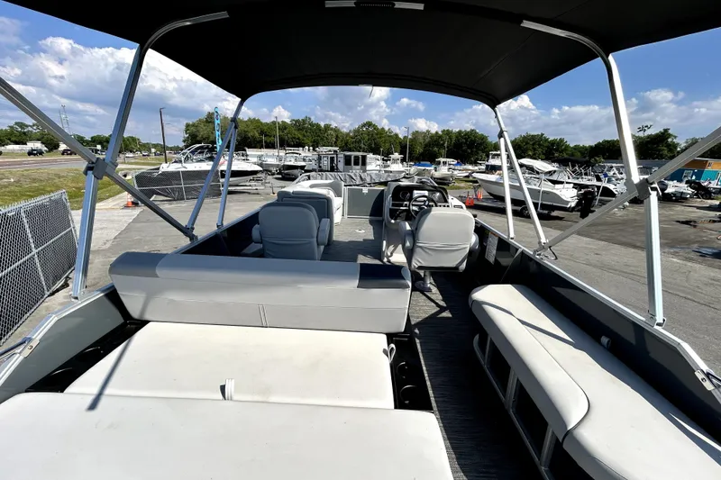 Slide: The Image of Interior view of 2025 Godfrey Sweetwater 2286 SFL boat with ignition keys. - 64